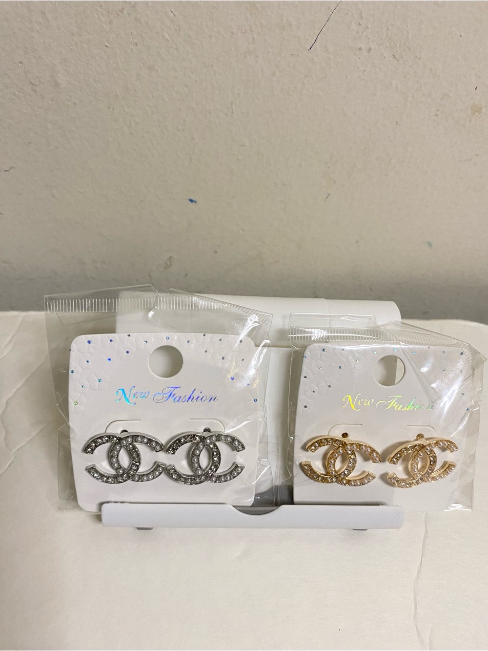 Crystal Interlocking CC-Style Earrings - Silver and Gold. Choose one